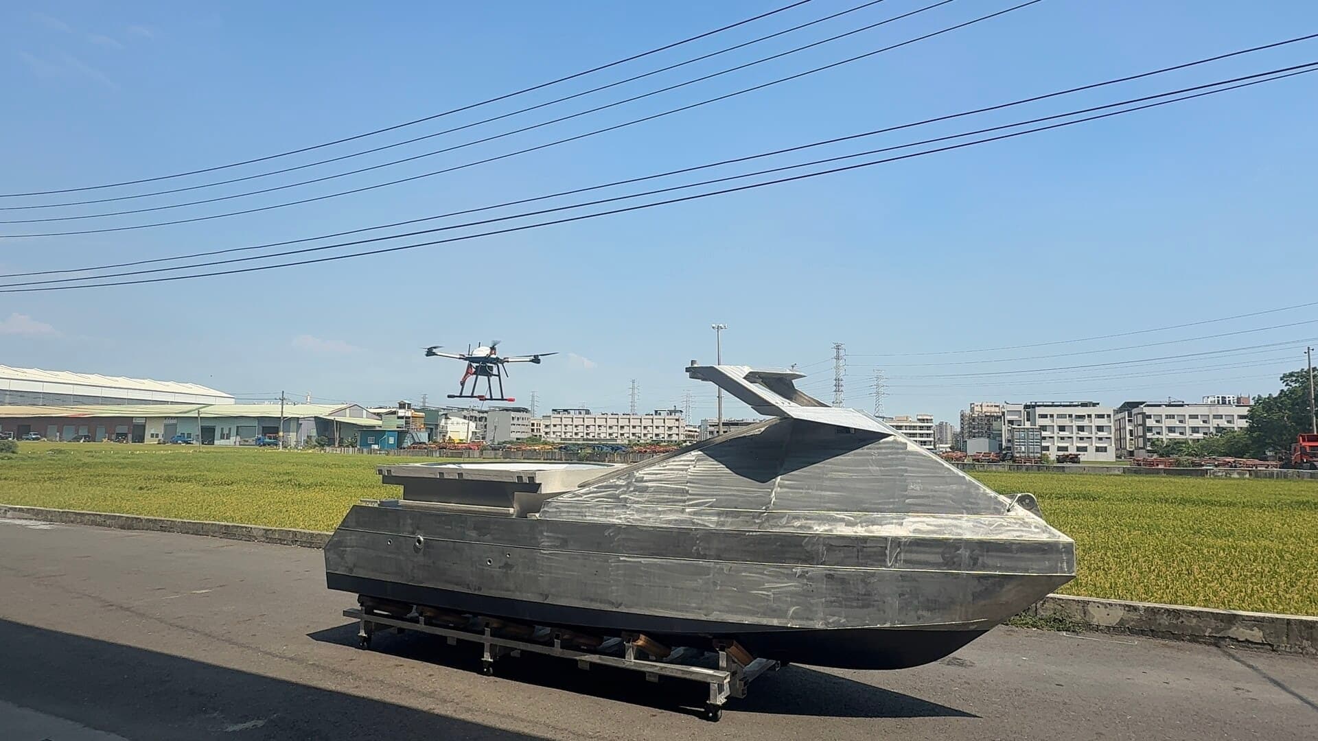 TF-100 prototype on transport with tethered drone above